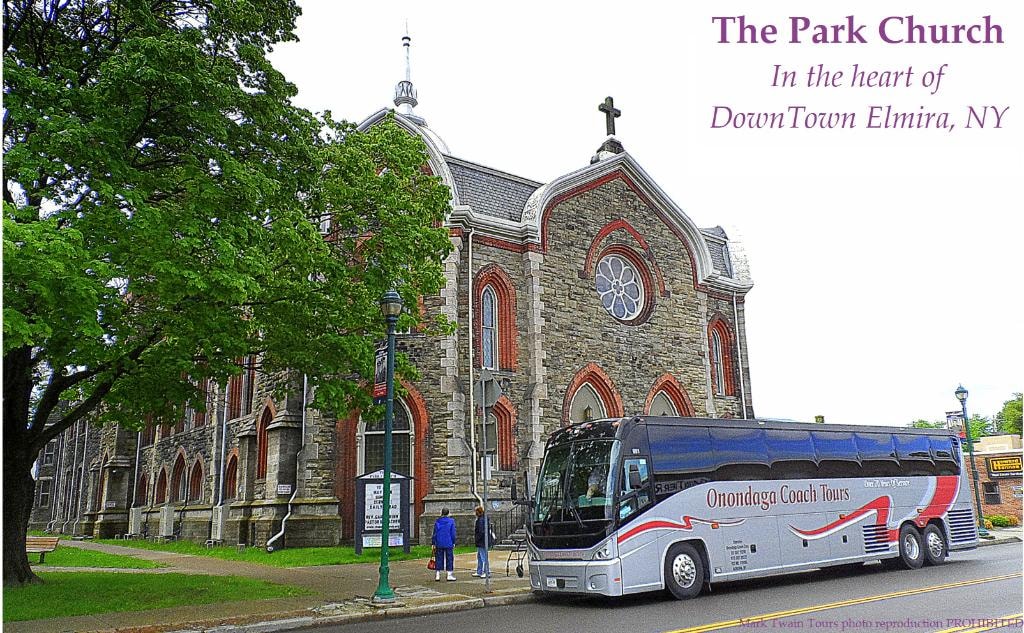 The Park Church in the heart of Downtown Elmira, NY with tour bus