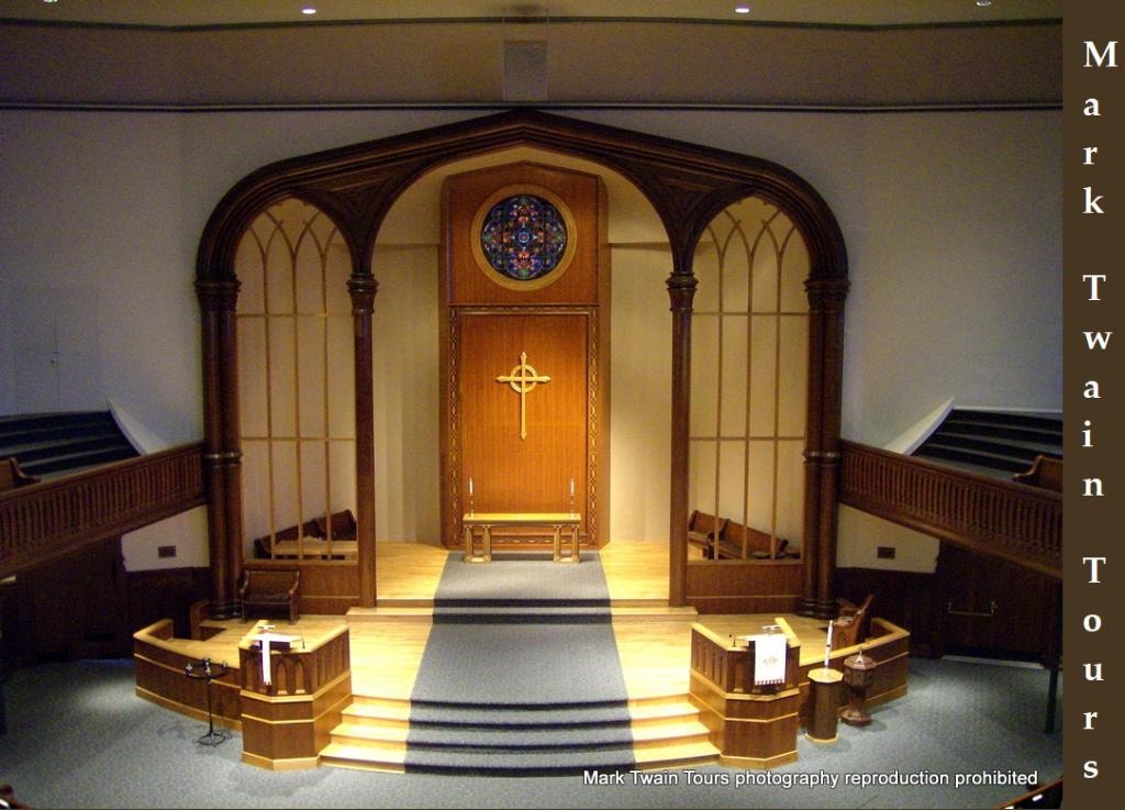 The Park Church sanctuary interior with Gothic arches and rose window
